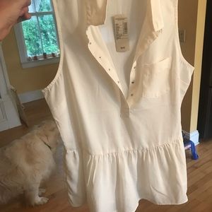 Cute, white peplum style top!